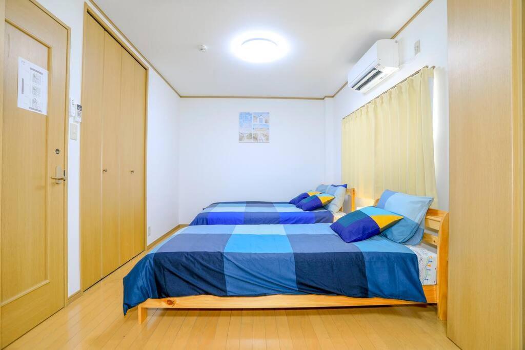 Ferienwohnung 鶴橋駅徒歩2分 トイレ浴室複数あり3階建て一軒家車庫付き Ōsaka Exterior foto